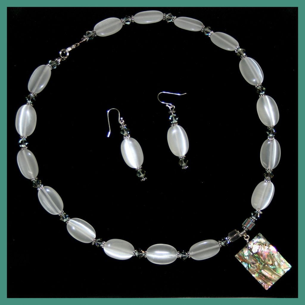 Necklace & Earrings, White Optic Oval Beads, Swarovski Crystals, and Sterling Clasp Necklace & Earrings, White Optic Oval Beads, Swarovski Crystals, and Sterling Clasp