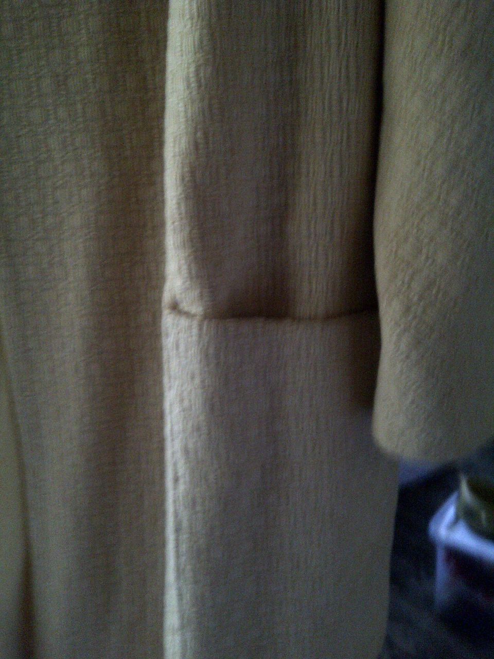 Cream colored vintage coat with two front large pockets Cream colored vintage coat with two front large pockets