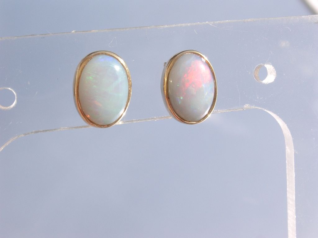 14kt Yellow Gold Fiery Oval Opal Stud Earrings 14kt Yellow Gold Fiery Oval Opal Stud Earrings