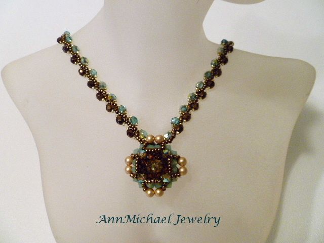 Handwoven Turquoise Blue and Bronze Crystal Pendant/Necklace Handwoven Turquoise Blue and Bronze Crystal Pendant/Necklace