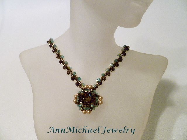 Handwoven Turquoise Blue and Bronze Crystal Pendant/Necklace Handwoven Turquoise Blue and Bronze Crystal Pendant/Necklace