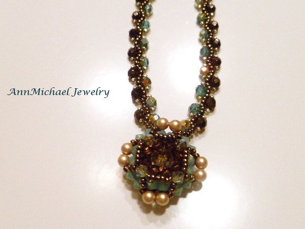 Handwoven Turquoise Blue and Bronze Crystal Pendant/Necklace Handwoven Turquoise Blue and Bronze Crystal Pendant/Necklace