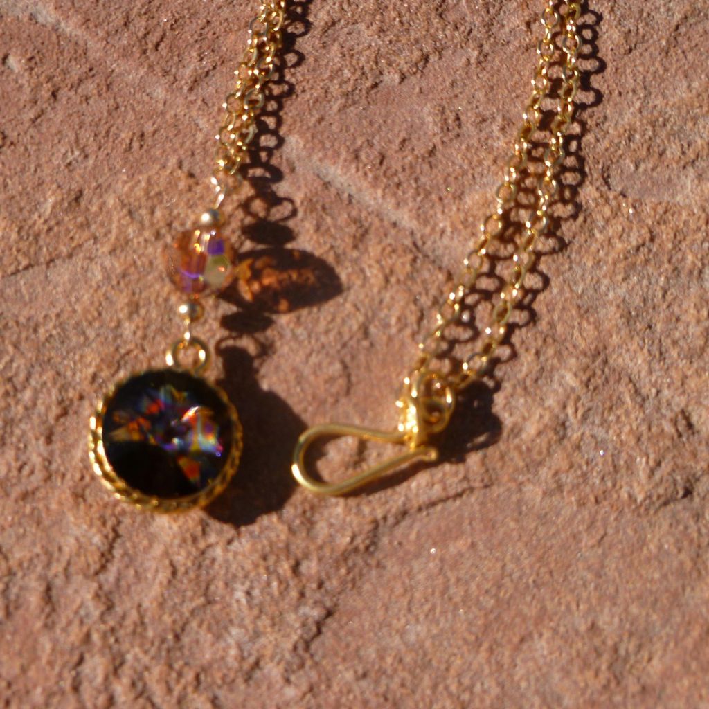Swarovski Peacock Crystal and Smokey Topaz Pendant Swarovski Peacock Crystal and Smokey Topaz Pendant