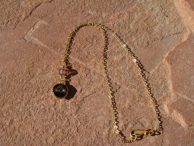 Swarovski Peacock Crystal and Smokey Topaz Pendant Swarovski Peacock Crystal and Smokey Topaz Pendant