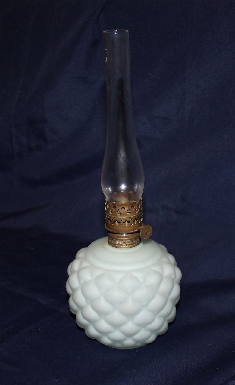 Blue satin cased miniature oil lamp Blue satin cased miniature oil lamp