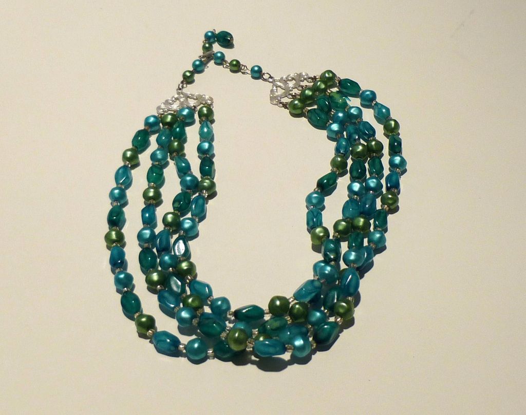 Vintage Hong Kong Lucite Four-Strand Necklace in Teal and Aquamarine Vintage Hong Kong Lucite Four-Strand Necklace in Teal and Aquamarine