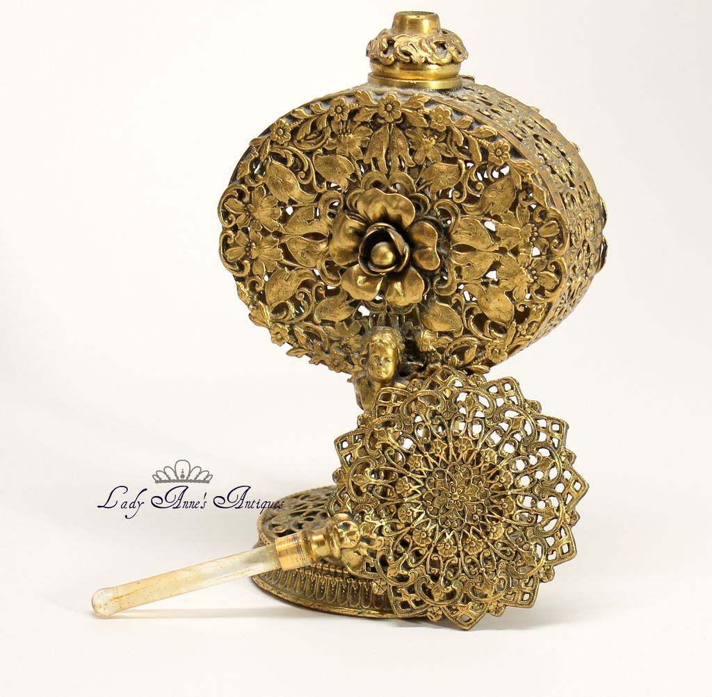 Ormolu Filigree Vintage Perfume Bottle Floral & Cherub Motifs Ormolu Filigree Vintage Perfume Bottle Floral & Cherub Motifs