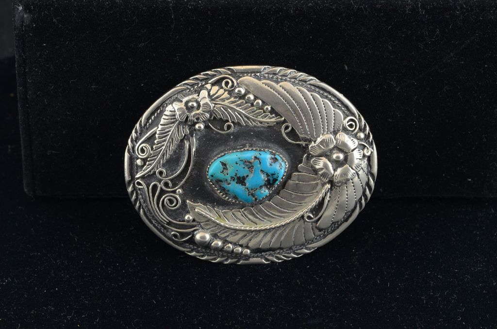 Handcrafted USA silvertoned belt buckle set with a turquoise Handcrafted USA silvertoned belt buckle set with a turquoise