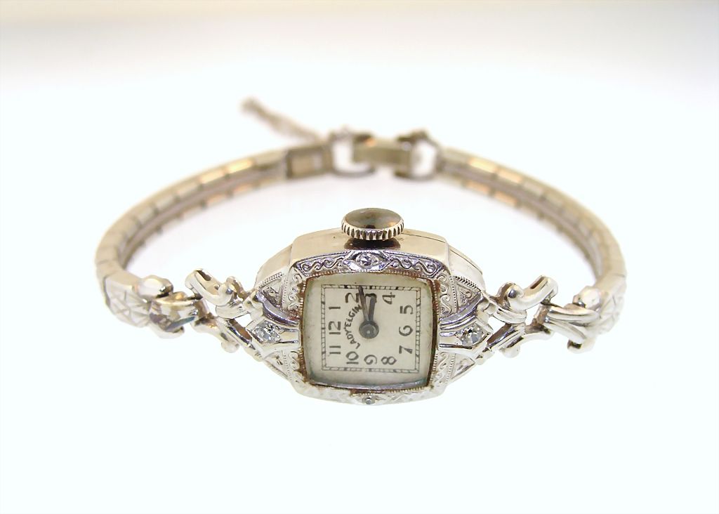  14 karat White Gold Lady Elgin Diamond Wrist Watch 14k: 48: Removed