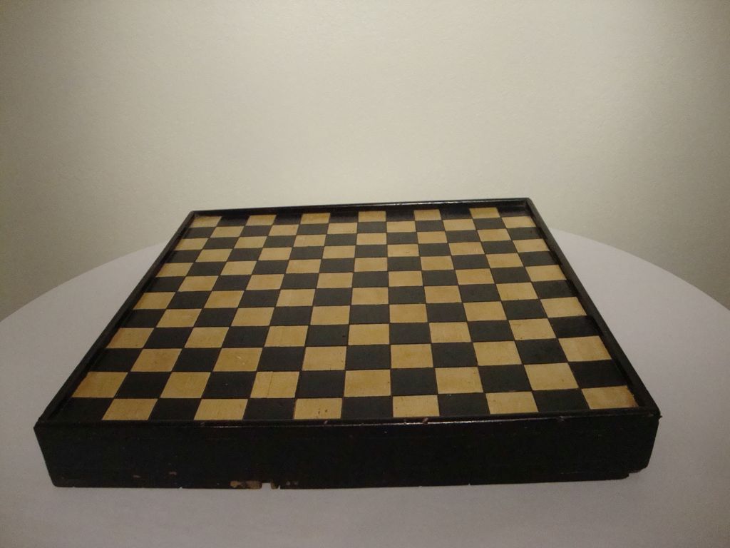 Game board with drawers; black and yellow. Game board with drawers; black and yellow.