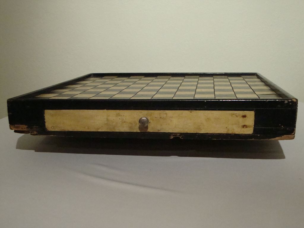 Game board with drawers; black and yellow. Game board with drawers; black and yellow.