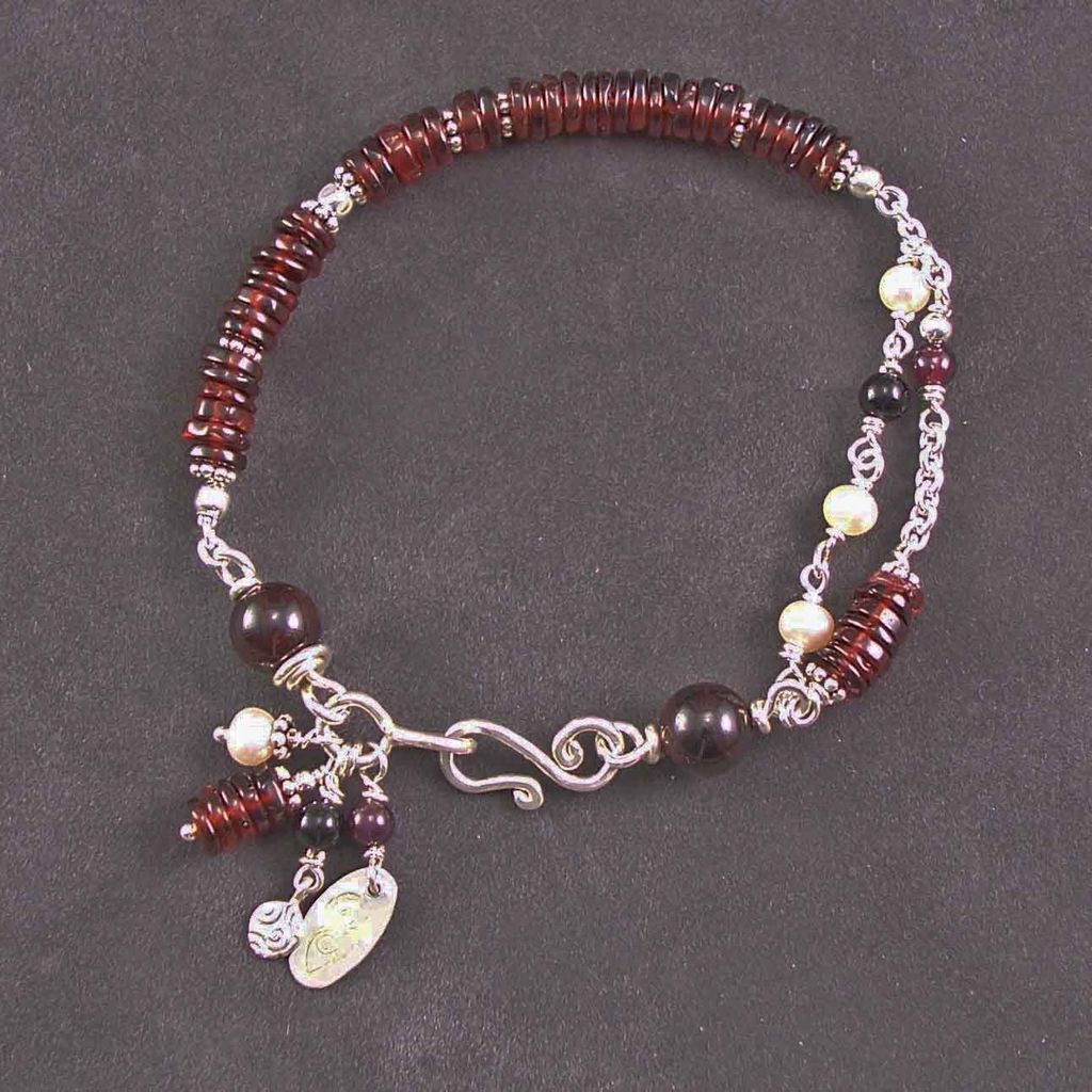 Sterling silver and garnet bracelet Sterling silver and garnet bracelet