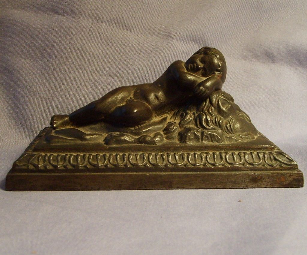 19th Century Putti Cherub Child Reclining On Lion Bronzed Metal Sculpture 19th Century Putti Cherub Child Reclining On Lion Bronzed Metal Sculpture