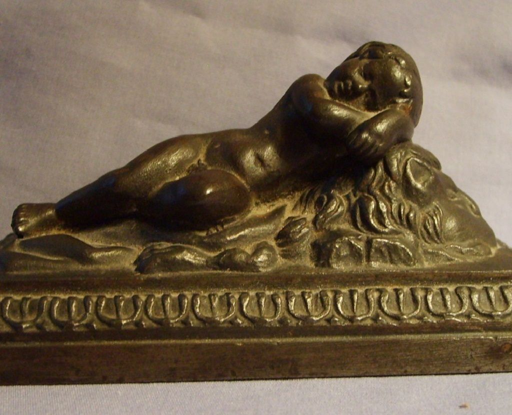 19th Century Putti Cherub Child Reclining On Lion Bronzed Metal Sculpture 19th Century Putti Cherub Child Reclining On Lion Bronzed Metal Sculpture