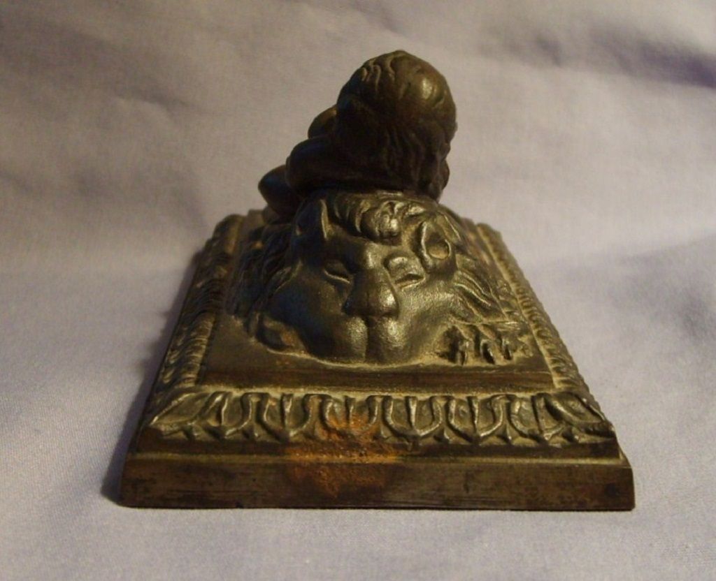 19th Century Putti Cherub Child Reclining On Lion Bronzed Metal Sculpture 19th Century Putti Cherub Child Reclining On Lion Bronzed Metal Sculpture