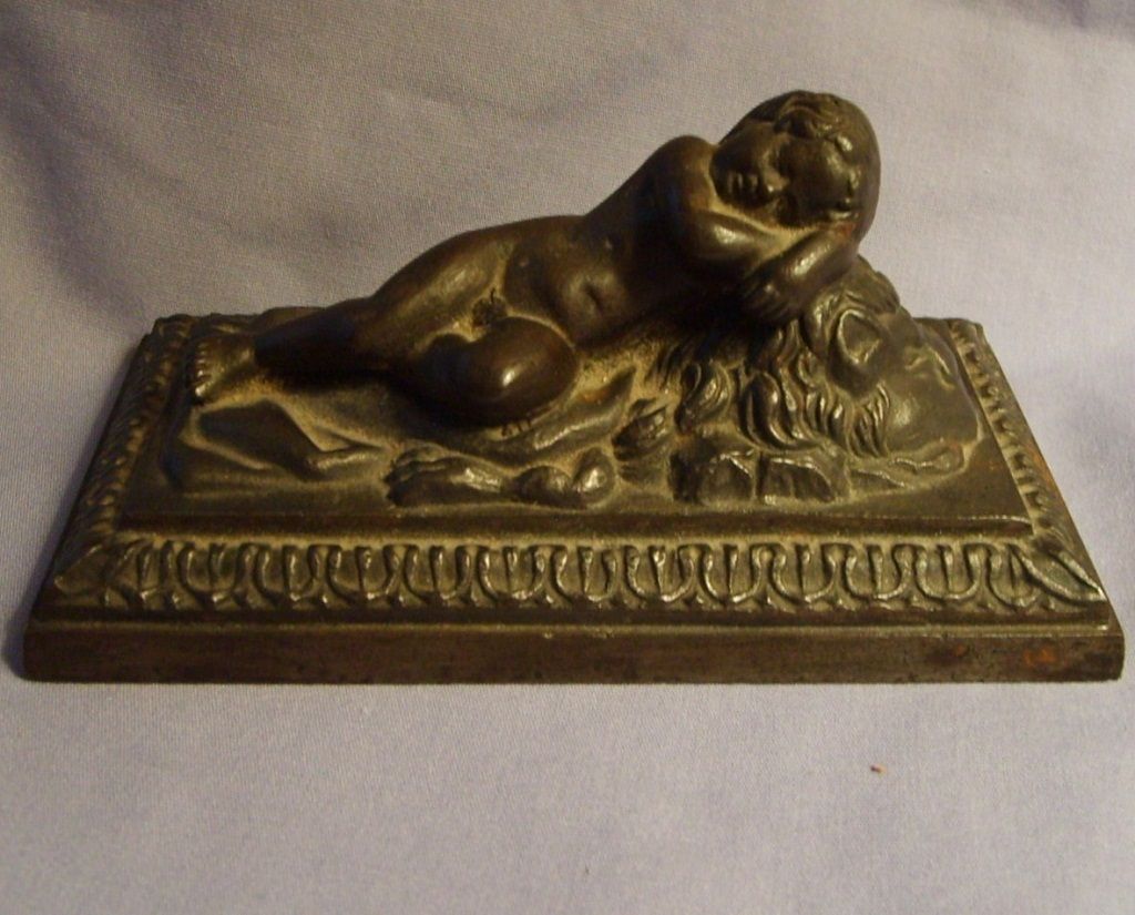 19th Century Putti Cherub Child Reclining On Lion Bronzed Metal Sculpture 19th Century Putti Cherub Child Reclining On Lion Bronzed Metal Sculpture