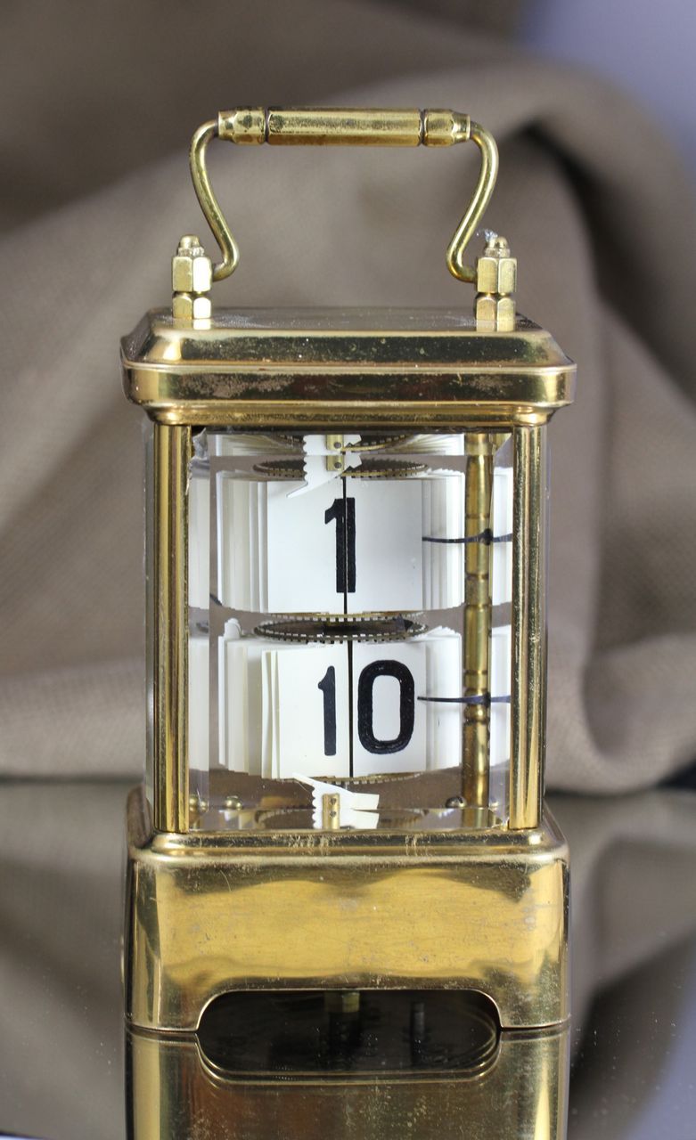 1902 Antique Brass Plato Flip Ticket Desk clock from vintagewatches on Ruby Lane