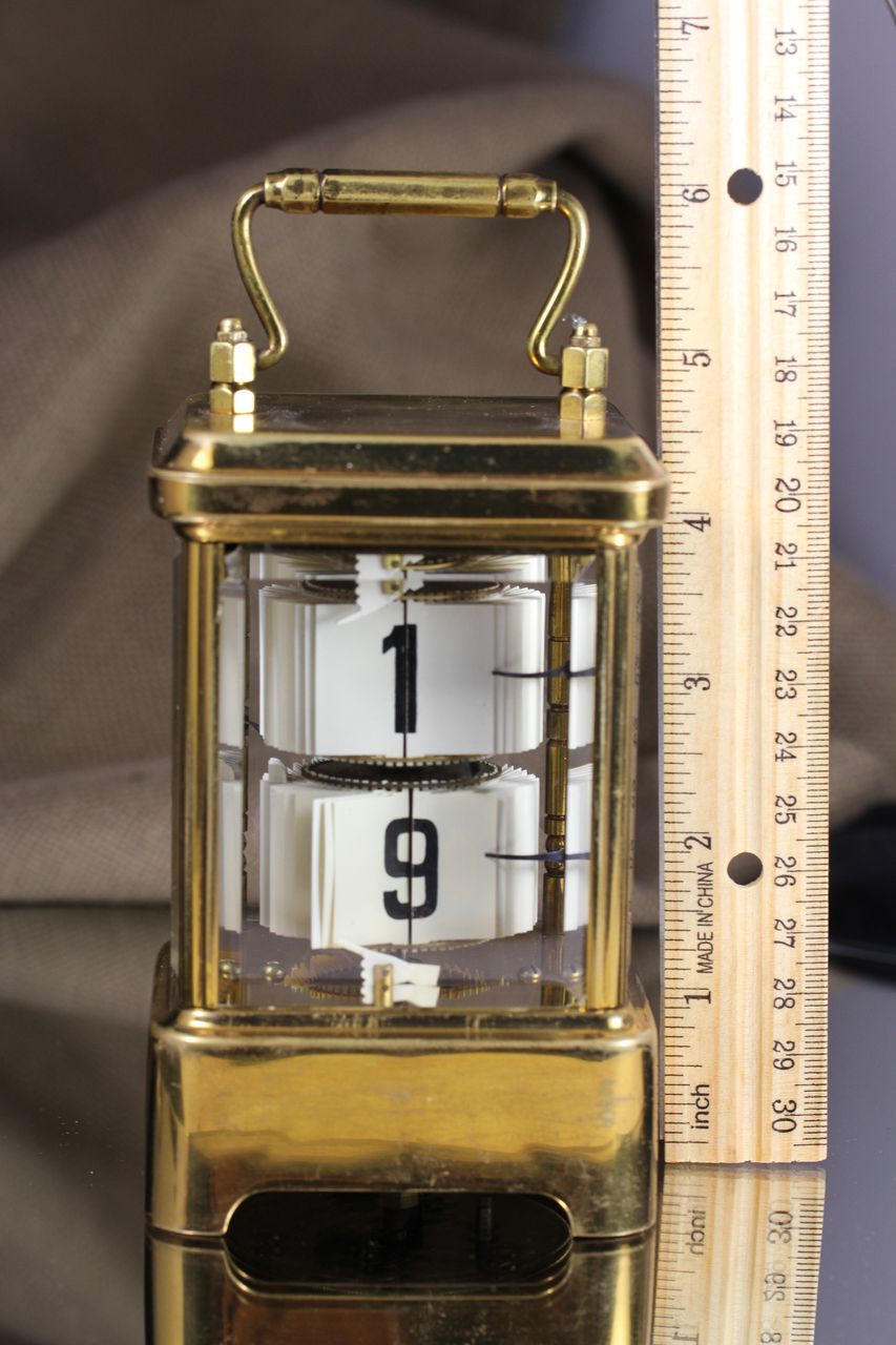 1902 Antique Brass Plato Flip Ticket Desk clock from vintagewatches on Ruby Lane