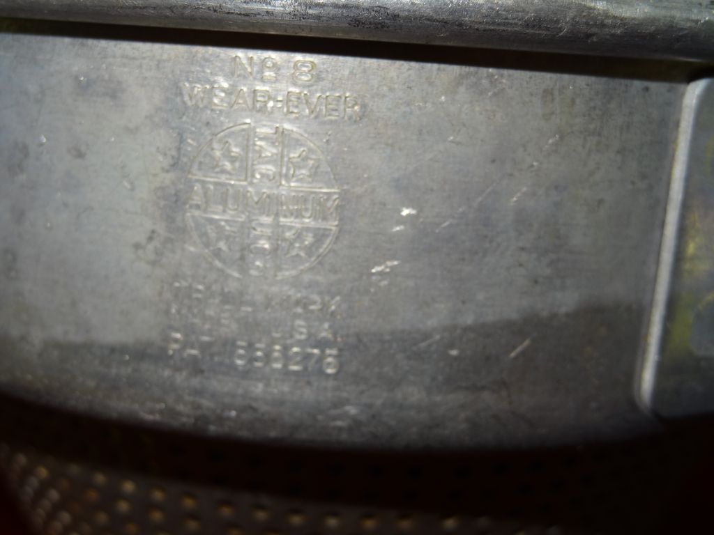 Vintage tin cake pan and Wear-ever strainer Vintage tin cake pan and Wear-ever strainer