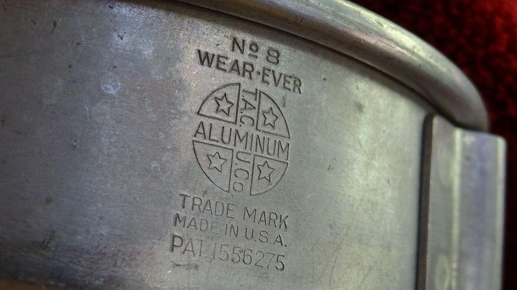 Vintage tin cake pan and Wear-ever strainer Vintage tin cake pan and Wear-ever strainer