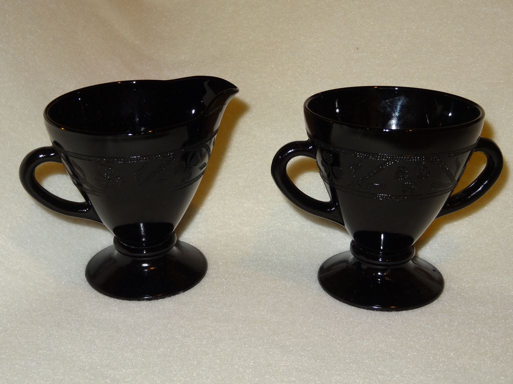 Hazel-Atlas Cloverleaf black creamer, sugar, 3 cups and saucers Hazel-Atlas Cloverleaf black creamer, sugar, 3 cups and saucers