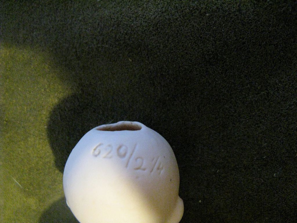 German All Bisque Jointed Child With Painted Eyes German All Bisque Jointed Child With Painted Eyes