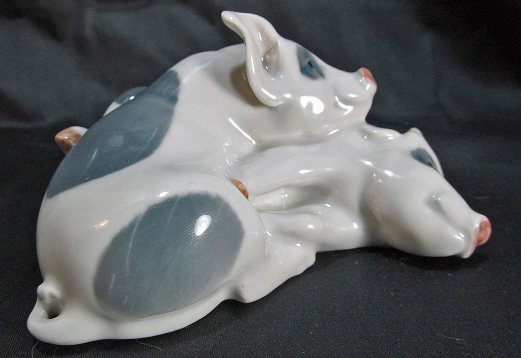 Royal Copenhagen Pair of Piglets #683 Designed by Erik Neilsen in 1906 Royal Copenhagen Pair of Piglets #683 Designed by Erik Neilsen in 1906