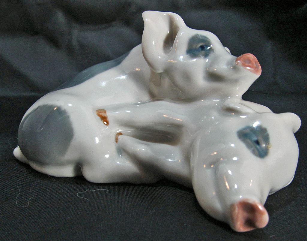 Royal Copenhagen Pair of Piglets #683 Designed by Erik Neilsen in 1906 Royal Copenhagen Pair of Piglets #683 Designed by Erik Neilsen in 1906