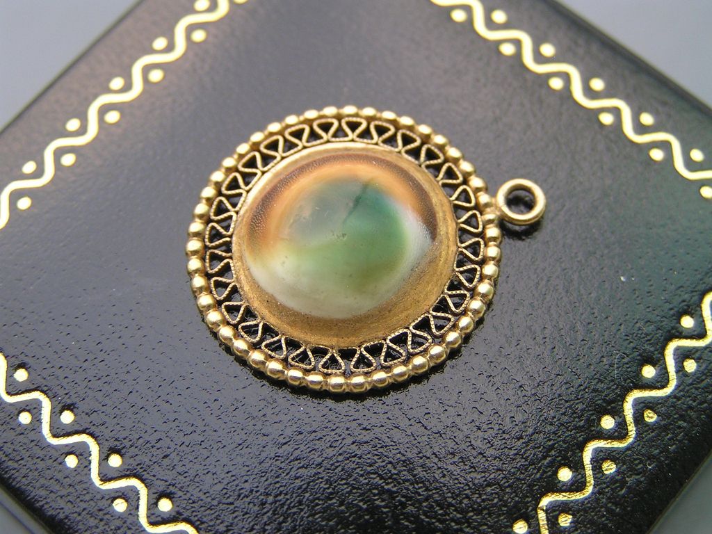 Vintage 10kt solid yellow Gold Operculum Shell Charm for Bracelet Vintage 10kt solid yellow Gold Operculum Shell Charm for Bracelet