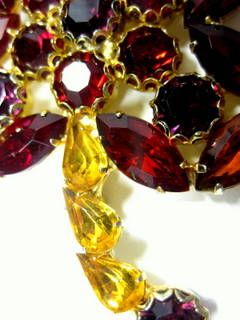 Vintage Four Petal Flower Brooch with Multi Shaped Rhinestones in Red, Purple, Amber and Gold Vintage Four Petal Flower Brooch with Multi Shaped Rhinestones in Red, Purple, Amber and Gold