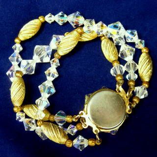 Vintage Clear Aurora Borealis Crystal Bicone Bead Triple Strand Bracelet Vintage Clear Aurora Borealis Crystal Bicone Bead Triple Strand Bracelet