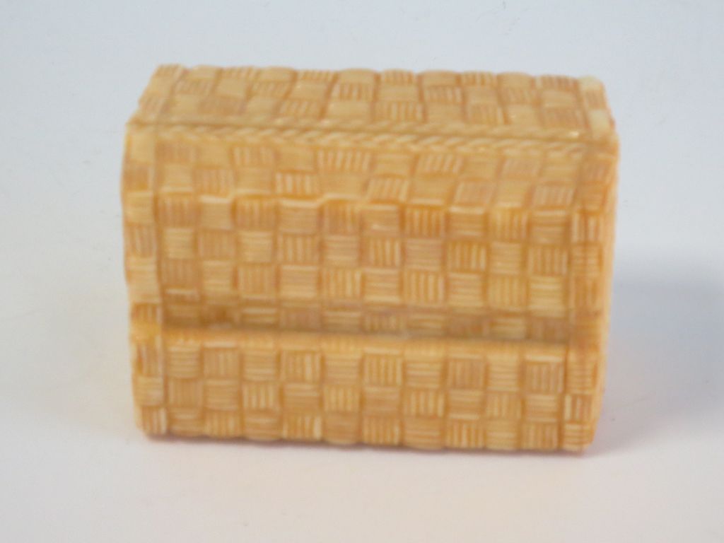 Bone box containing Put N' Take Bone box containing Put N' Take
