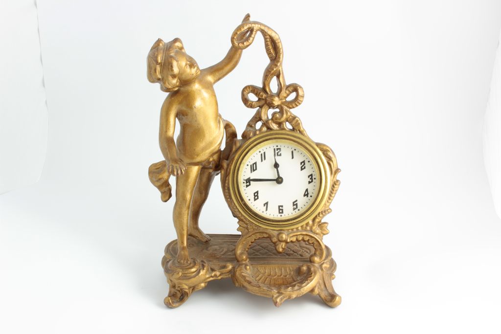 Desk Clock With Cherub, Clock Features A German Movement. Desk Clock With Cherub, Clock Features A German Movement.