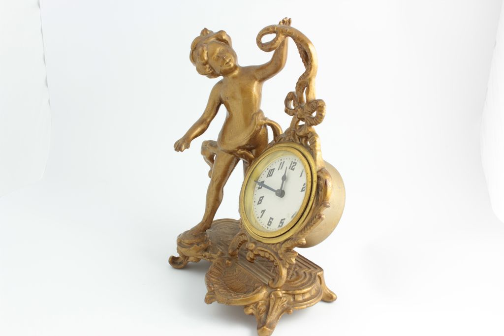 Desk Clock With Cherub, Clock Features A German Movement. Desk Clock With Cherub, Clock Features A German Movement.