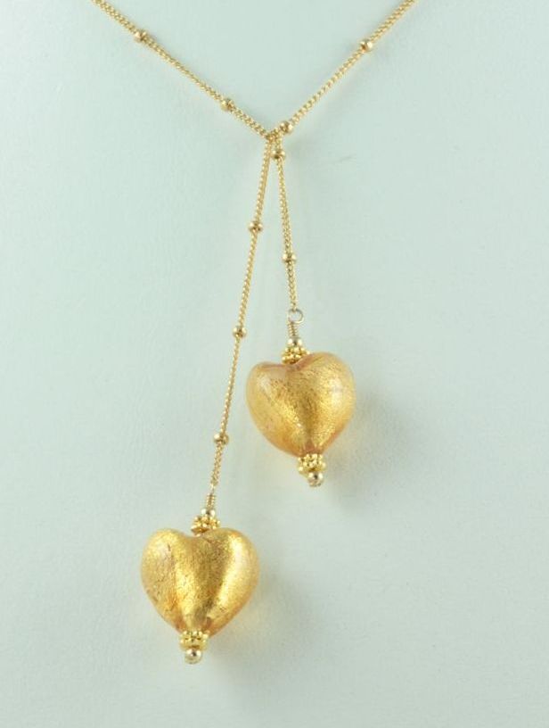 Olivia Stuard Lariat Necklace with Murano glass hearts infused with 24 kt gold Olivia Stuard Lariat Necklace with Murano glass hearts infused with 24 kt gold