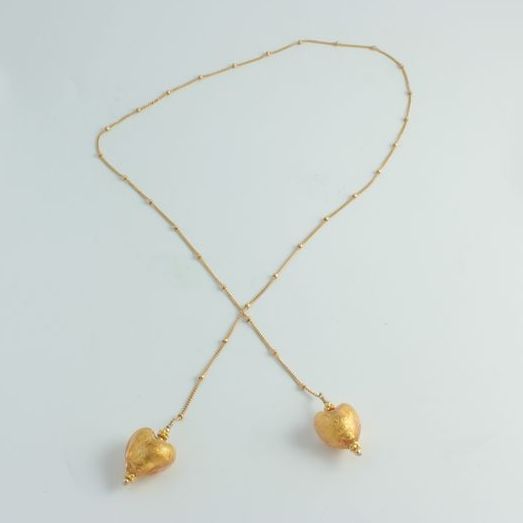 Olivia Stuard Lariat Necklace with Murano glass hearts infused with 24 kt gold Olivia Stuard Lariat Necklace with Murano glass hearts infused with 24 kt gold