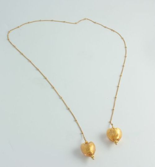Olivia Stuard Lariat Necklace with Murano glass hearts infused with 24 kt gold Olivia Stuard Lariat Necklace with Murano glass hearts infused with 24 kt gold