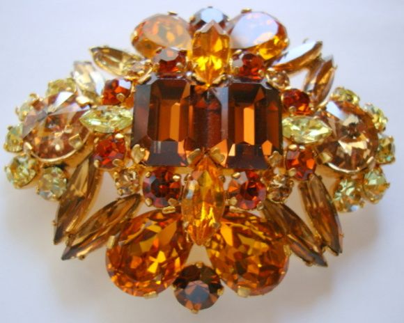 Large, Domed, Multi-leveled Brooch with Warm Rhinestone Colours Large, Domed, Multi-leveled Brooch with Warm Rhinestone Colours