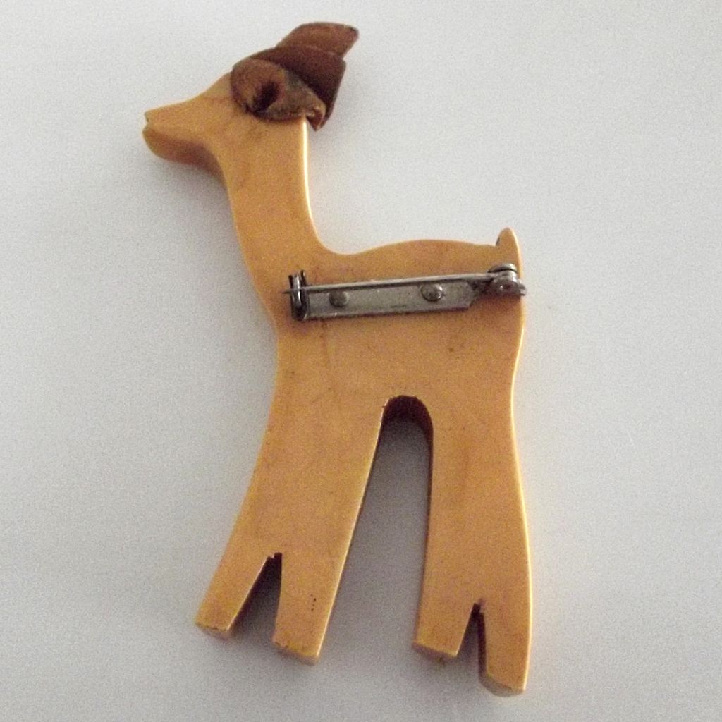 Carved Yellow Bakelite Deer Pin Carved Yellow Bakelite Deer Pin
