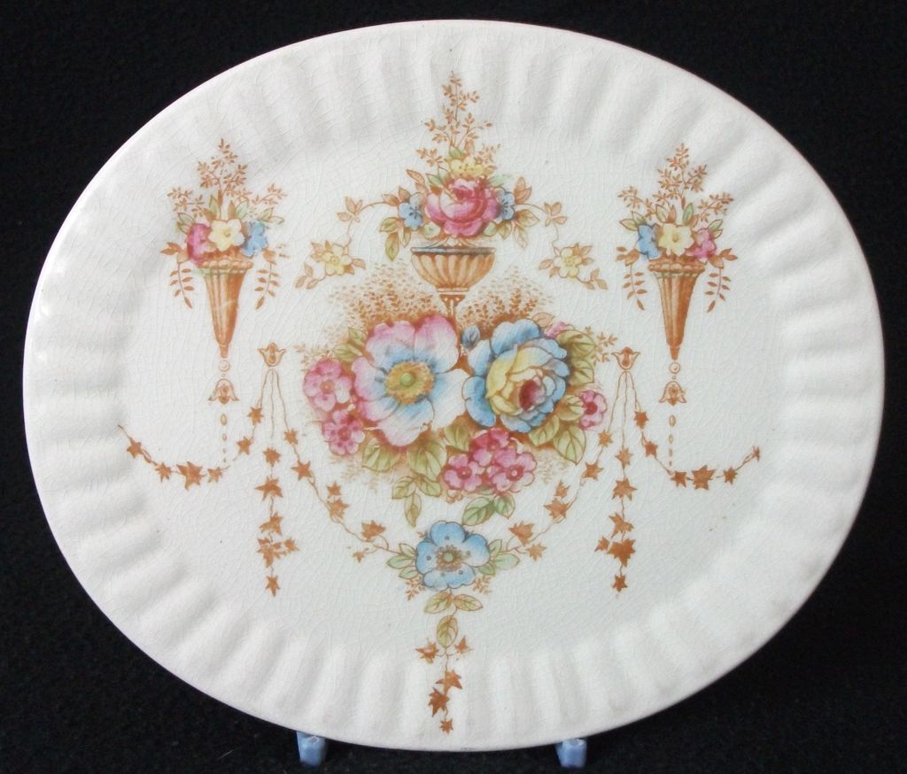 Antique Pottery Floral Patterned Tea Pot Stand / Trivet - Oval Shape "Devon Ware Fieldings" Antique Pottery Floral Patterned Tea Pot Stand / Trivet - Oval Shape "Devon Ware Fieldings"