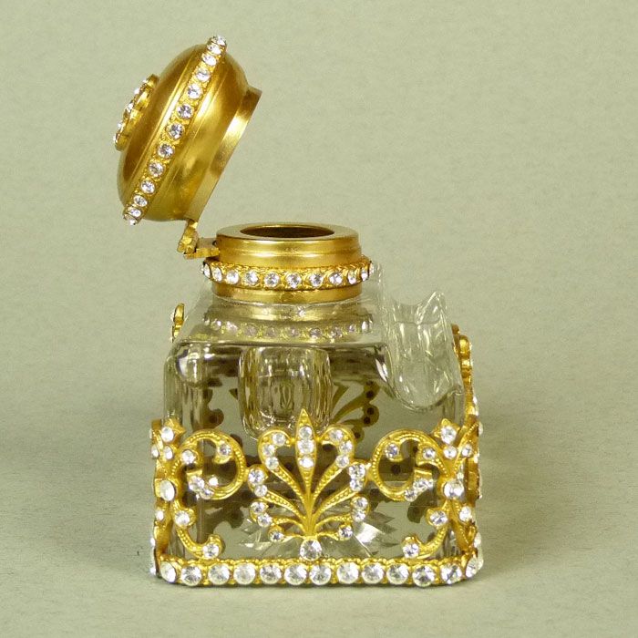A French Glass & Gilt Mounted Inkwell, enhanced with clear Paste Stones A French Glass & Gilt Mounted Inkwell, enhanced with clear Paste Stones