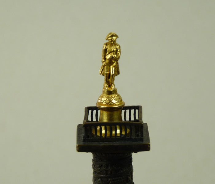 A classical bronze column surmounted by Napoleon A classical bronze column surmounted by Napoleon