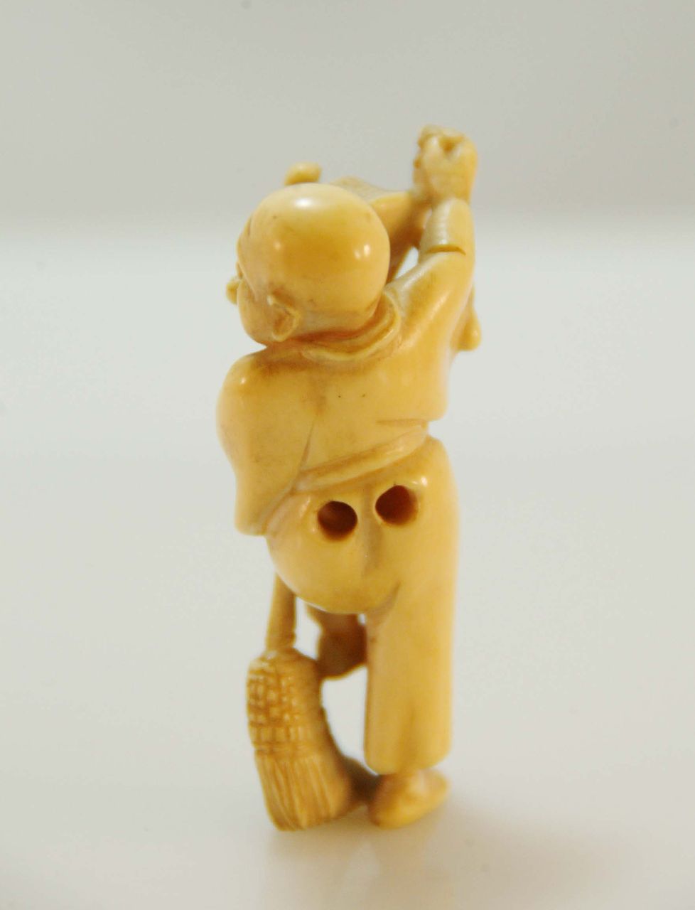 Carved Ivory Netsuke of Man with Broom and Teapot with Mouse c. 19th C. Carved Ivory Netsuke of Man with Broom and Teapot with Mouse c. 19th C.