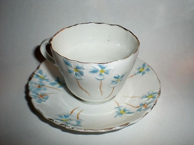 Vintage German demitasse Cup and Saucer with hand painted flowers by C & E Carstens Vintage German demitasse Cup and Saucer with hand painted flowers by C & E Carstens