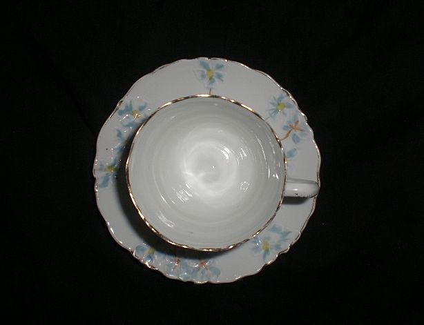 Vintage German demitasse Cup and Saucer with hand painted flowers by C & E Carstens Vintage German demitasse Cup and Saucer with hand painted flowers by C & E Carstens