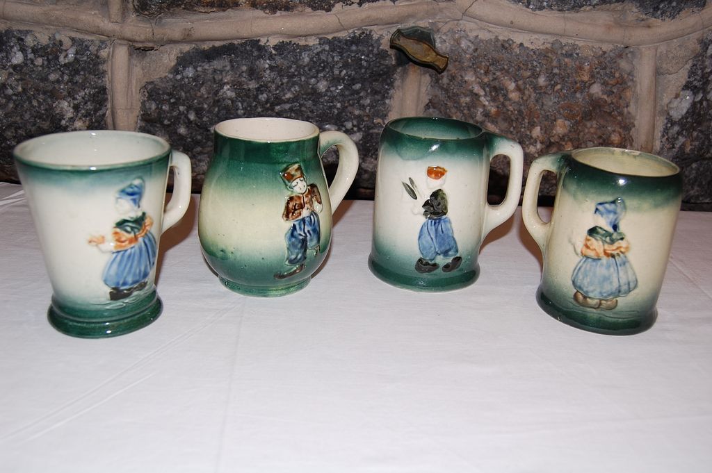 Early 1900's Roseville Dutch Art Pottery Holland Stein Set Early 1900's Roseville Dutch Art Pottery Holland Stein Set