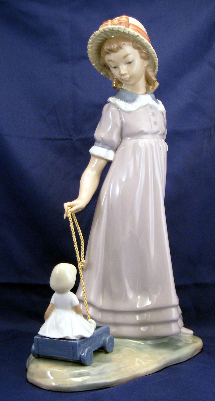 Lladro "Girl pulling toy wagon" "Tirand de la carretilla" Figurine # 5044 - beautiful detail Lladro "Girl pulling toy wagon" "Tirand de la carretilla" Figurine # 5044 - beautiful detail