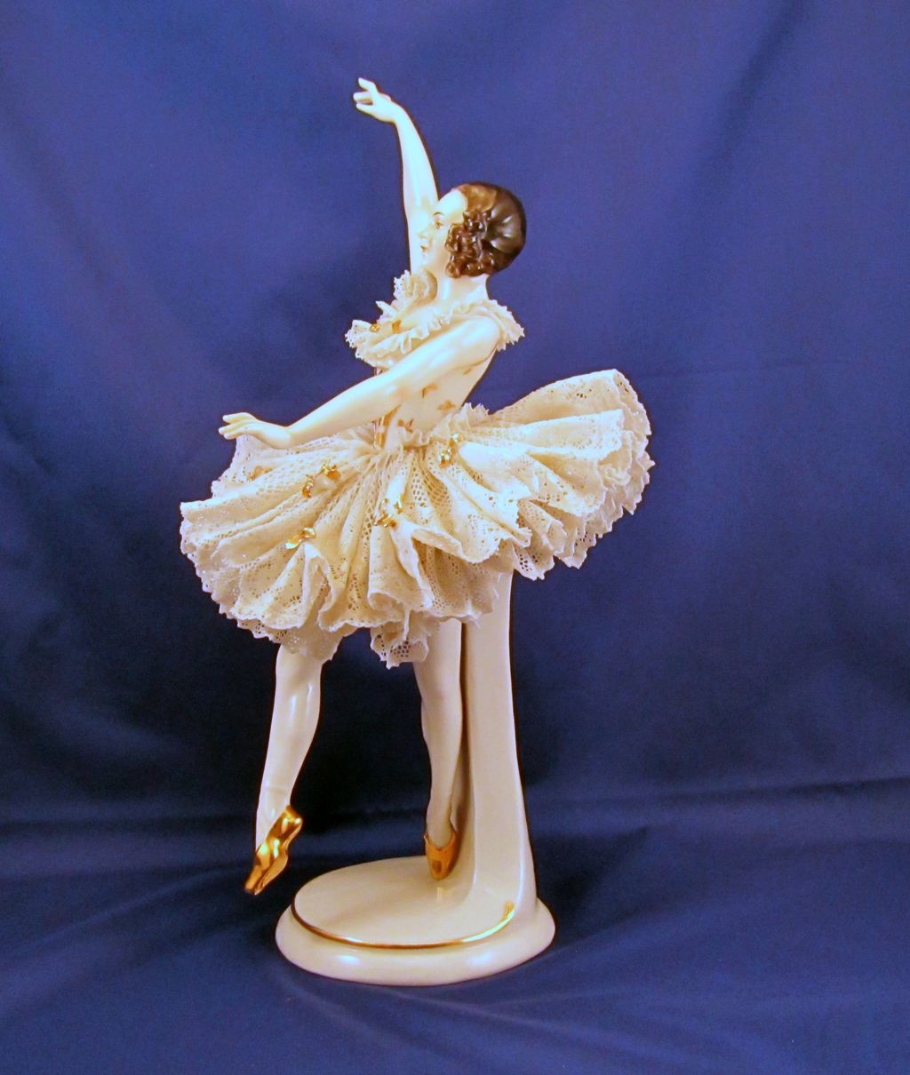 Dresden lace ballerina figurine in a graceful pirouette Dresden lace ballerina figurine in a graceful pirouette