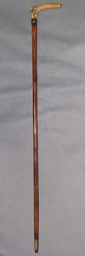 "Salesman Sample Cane" with Bone Grip Handle,Tarnished "Sterling" marked Silver Ferrule, Wood Shaft, and original bottom Metal Tip & Only 23 inches Long ! "Salesman Sample Cane" with Bone Grip Handle,Tarnished "Sterling" marked Silver Ferrule, Wood Shaft, and original bottom Metal Tip & Only 23 inches Long !