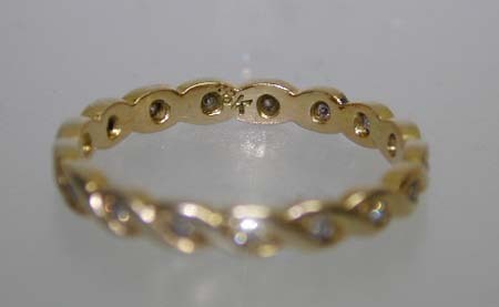 Vintage 18K Gold & Diamonds Eternity Ring With a Twist Vintage 18K Gold & Diamonds Eternity Ring With a Twist